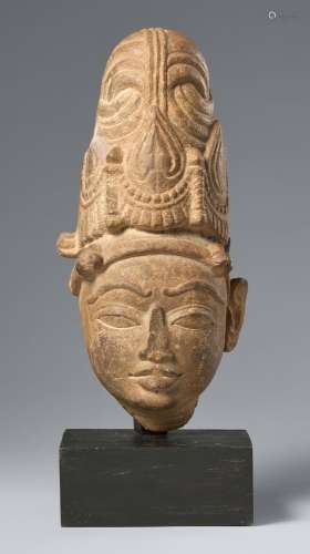 A pinkish sandstone head of Vishnu. Central India. Circa 11t...