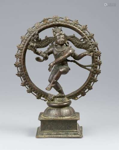 A Chola style copper alloy figure of Shiva Nataraja within a...