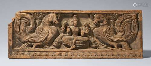 A carved wood lintel. India. 20th century