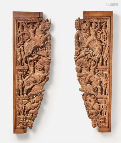 A pair of carved possibly teak wood architectural brackets. ...