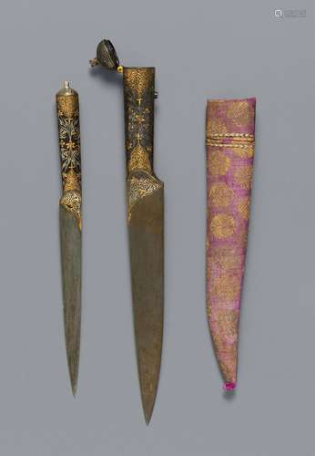 A North Indian kard oder pesh kabz with scabbard. 19th centu...