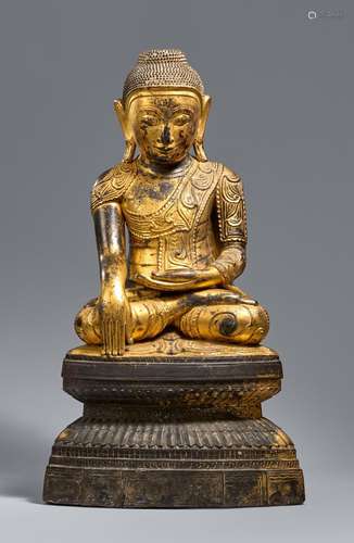 A Shan lacquered wood figure of Buddha Shakyamuni. Burma. 19...