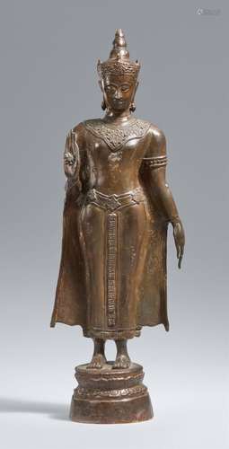 An Ayutthaya-style bronze figure of a crowned and bejewelled...