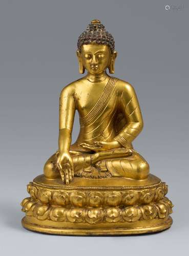 A gilt bronze figure of buddha Bhaisajyaguru (Healing Buddha...