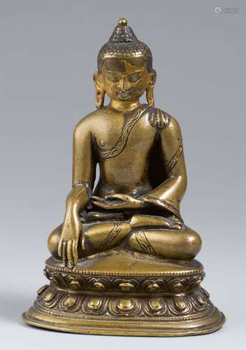 A Tibetan copper alloy figure of Buddha Shakyamuni with cold...