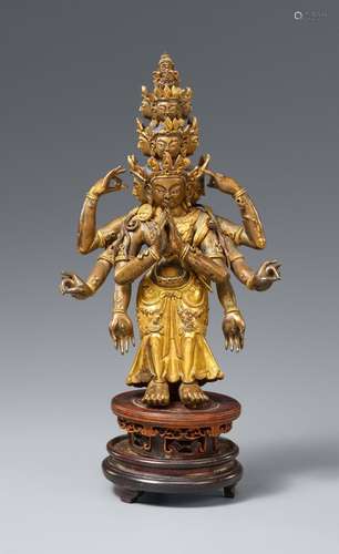 A Sinotibetan gilt bronze figure of Ekadasamukha-Avalokitesv...