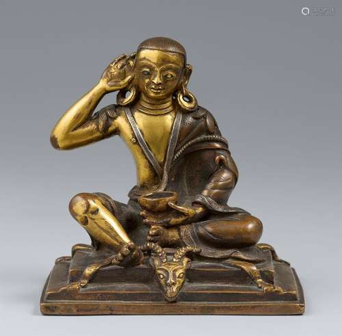 A parcel-gilt copper-alloy figure of Milarepa. Tibet. 19th/2...