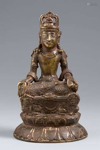 A silver-inlaid bronze figure of Maitreya. Kashmir. In the S...