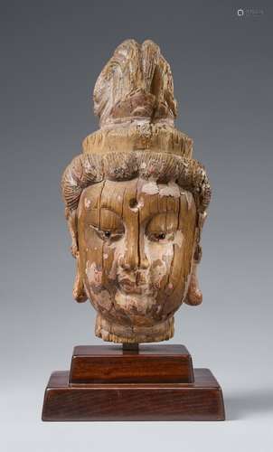 A Yuan style wooden head of a Guanyin