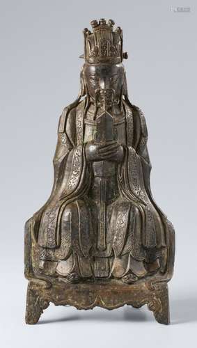 A bronze figure of Tianguan, the Emperor-Official of Heaven....