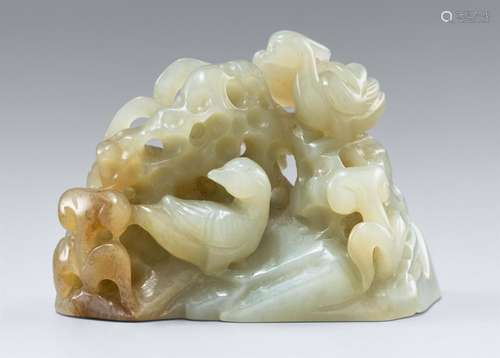 A light greyish green jade openwork carving of a pair of man...