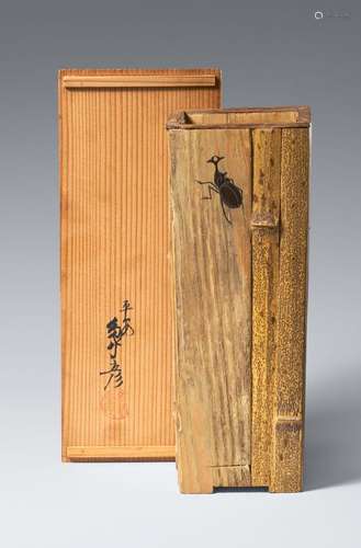 A wood and bamboo ikebana vase. Early 20th century