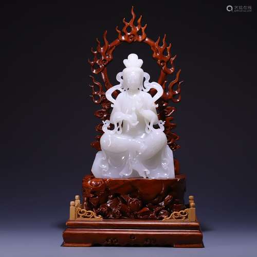 A HETIAN HUANYIN SEATING STATUE