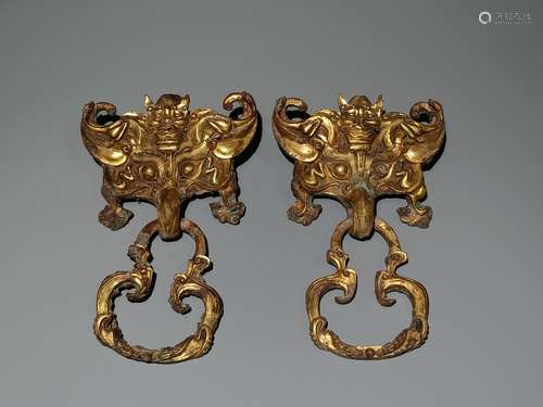 A PAIR OF GILT-BRONZE BEAST KNOBS