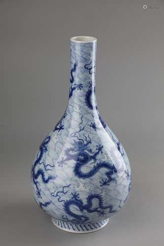 A BLUE AND WHITE DRAGON BOTTLE VASE