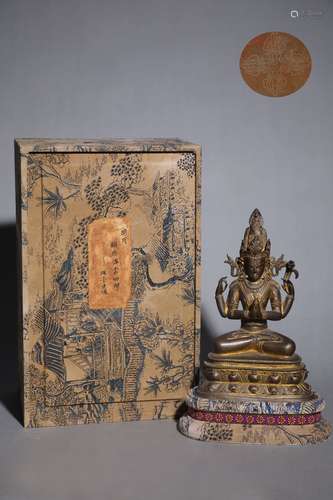 A GILT-BRONZE GUANYIN STATUE