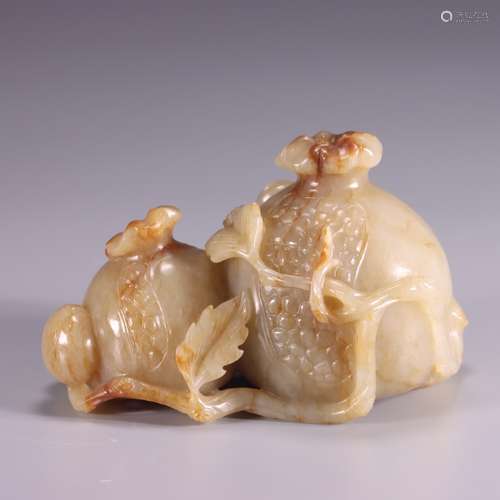 A HETIAN JADE STATUE