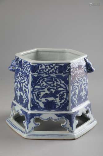 A BLUE AND WHITE BRUSH POT