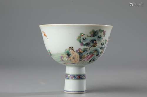 A FAMILLE ROSE FIGURE AND STORY  STEM CUP