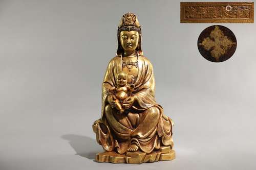 A GILT-BRONZE GUANYIN STATUE