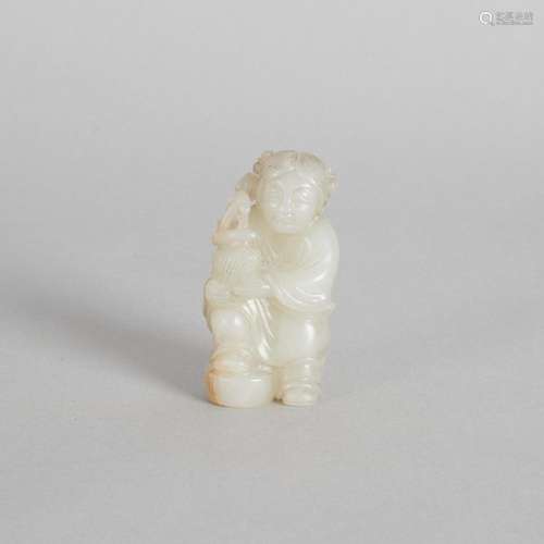 A Chinese Celadon Jade Carving of a boy holding a flower pot