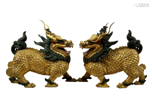 Two Gilt Bronze Statuettes of Kylin