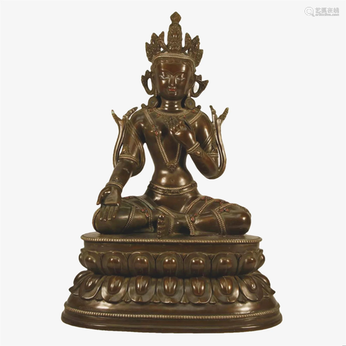 A Bronze Figure Of Guanyin