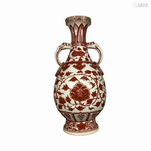 A Copper-Red 'Scrolling Flower' Elephant-Handled V...