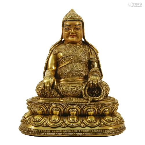 A Gilt-Bronze Figure Of Tsongkapa