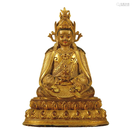 A Gilt-Bronze Figure Of Padmasambhava