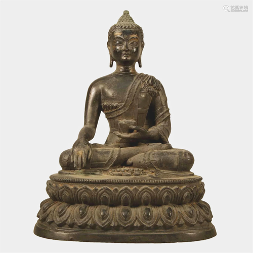 A Gilt-Bronze Figure Of Buddha Shakyamuni