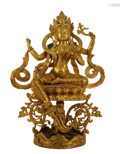 A Gilt-Bronze Figure Of Four-Armed Avalokiteshvara