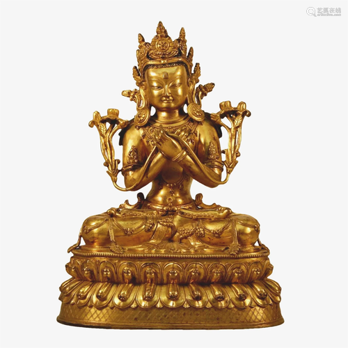 A Gilt-Bronze Figure Of Tara