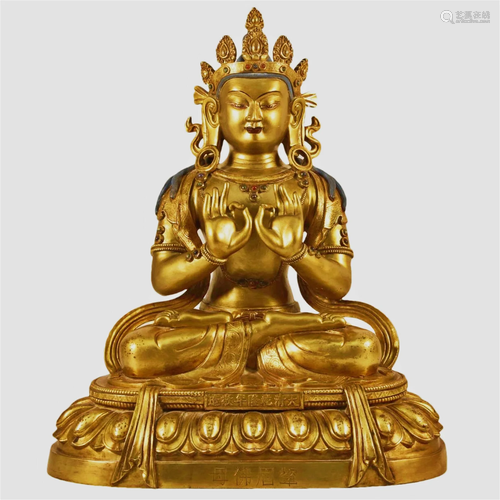 A Gilt-Bronze Gem-Inlaid Figure Of Buddha