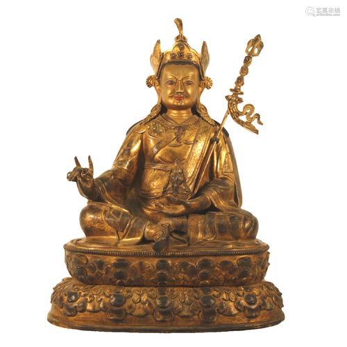 A Gilt-Bronze Figure Of Padmasambhava