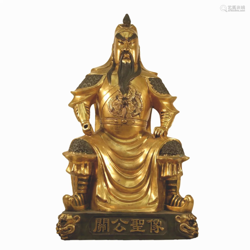 A Gilt-Bronze Figure Of Guangong