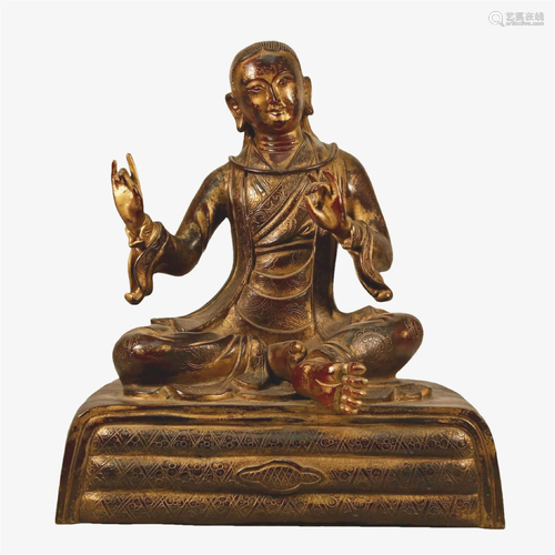 A Gilt-Bronze Figure Of Mahasiddha