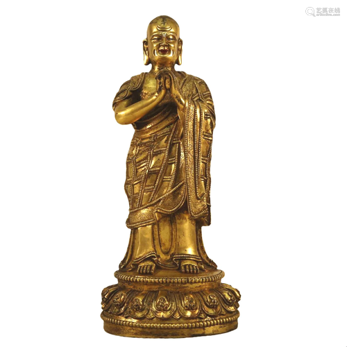 A Gilt-Bronze Figure Of Arhat