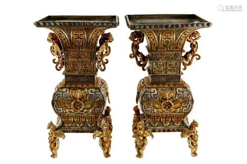 A Pair Of Gilt-Silver Vases