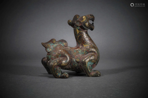 Han Dynasty silver beast inlaid with gold