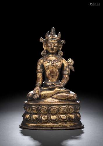 A FINE AND EARLY GILT-COPPER FIGURE OF AVALOKITESHVARA