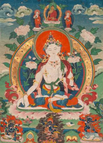 A THANGKA OF THE WHITE TARA WITH BROCADE AND SILK MOUNTING