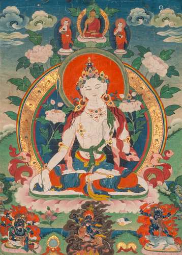 A THANGKA OF THE WHITE TARA WITH BROCADE AND SILK MOUNTING