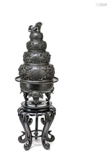 A VERY LARGE FIVE-PART BRONZE CENSER AND COVER ON CARVED WOO...