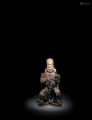 A RARE BROWN-GLAZED CIZHOU FIGURE OF SEATED GENERAL, PROBABL...