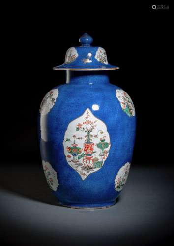 A FINE POWDERBLUE-GROUND FAMILLE VERTE VASE AND COVER