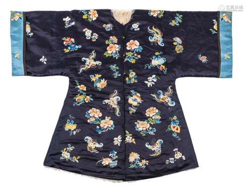 A WINTER OVERGARMENT WITH FLOWERS AND BUTTERFLIES, FUR-LINED
