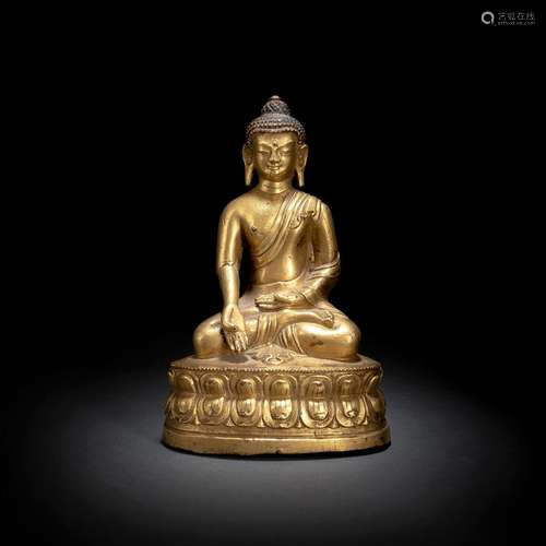 A GILT-BRONZE FIGURE OF BUDDHA SHAKYAMUNI