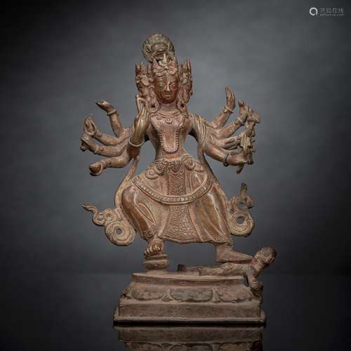 A BRONZE FIGURE OF KALI