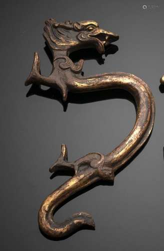 A GILT-BRONZE FITTING OR HANDLE IN SHAPE OF A DRAGON